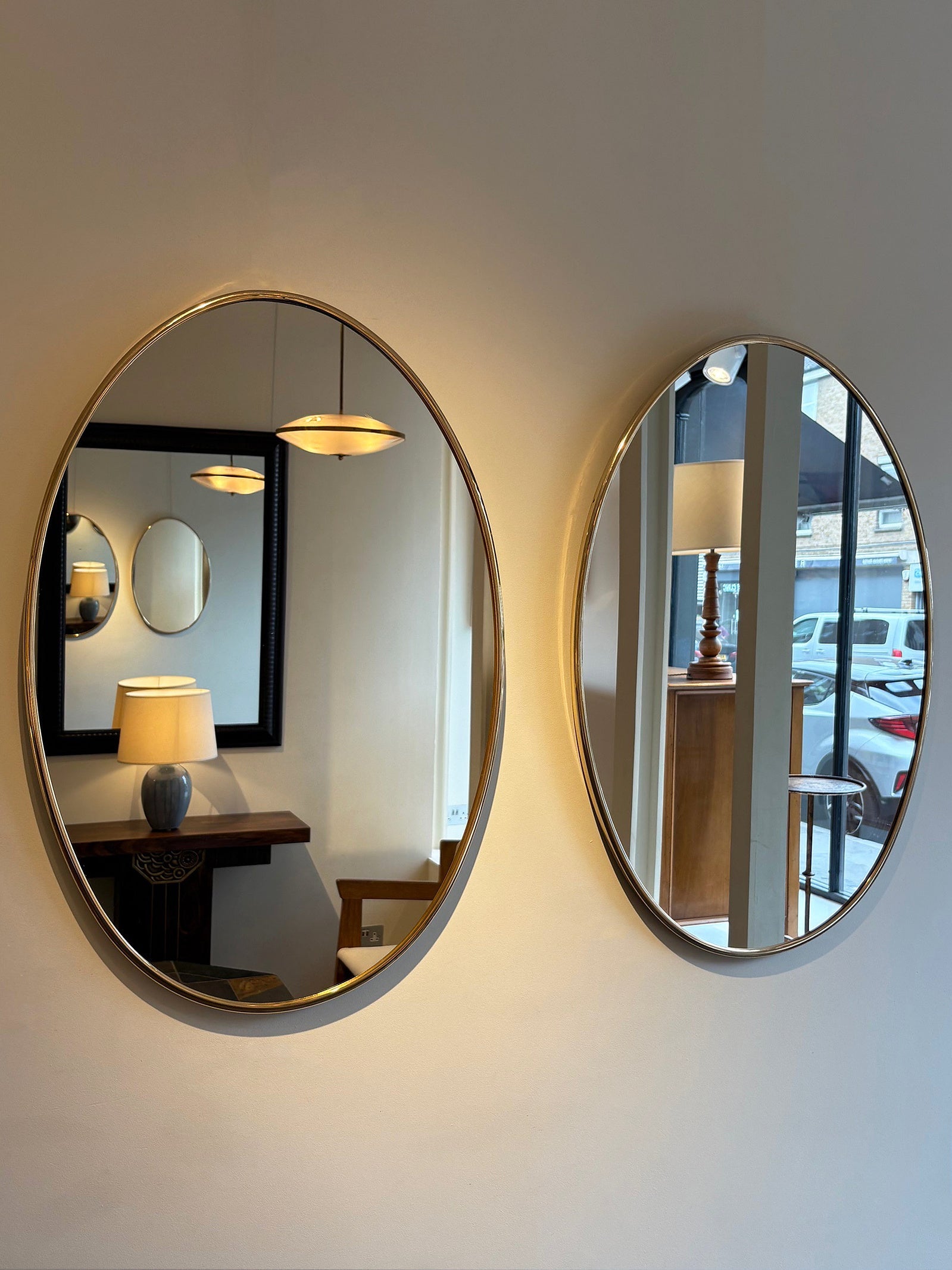 Pair of Brass Oval Mirrors