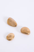 10463- Three Bronze Pebbles by Monique Gerber