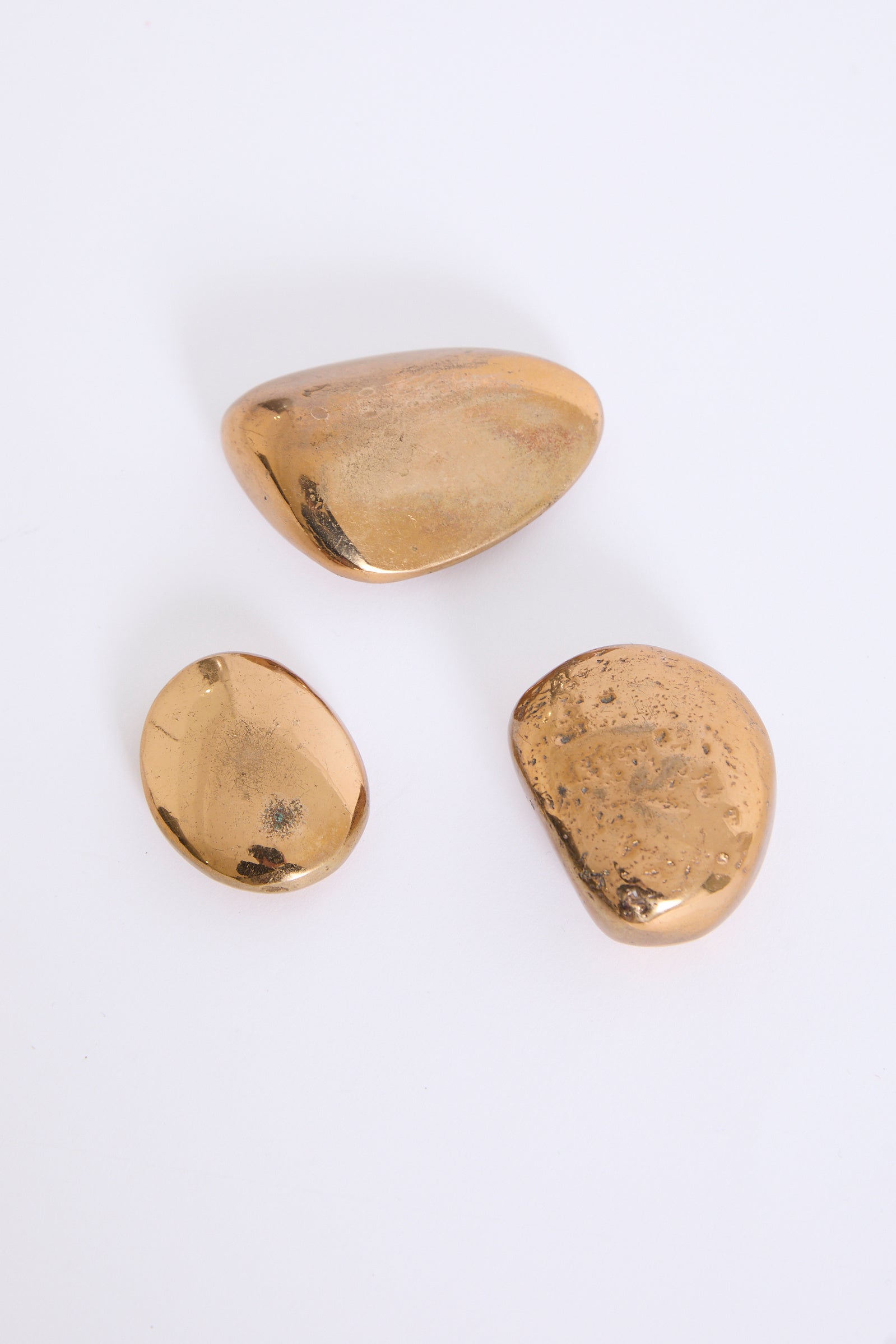 Three Bronze Pebbles by Monique Gerber