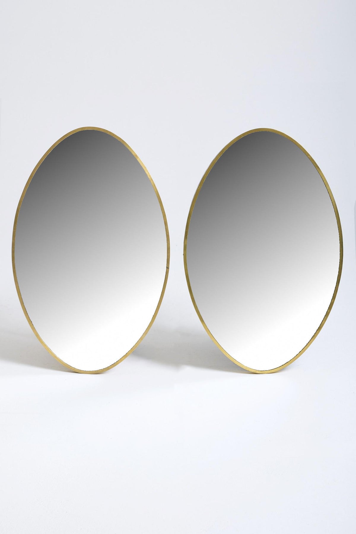 Pair of Oval Brass Mirrors
