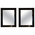 9352- Pair of Ebonised Carved Wood Mirrors