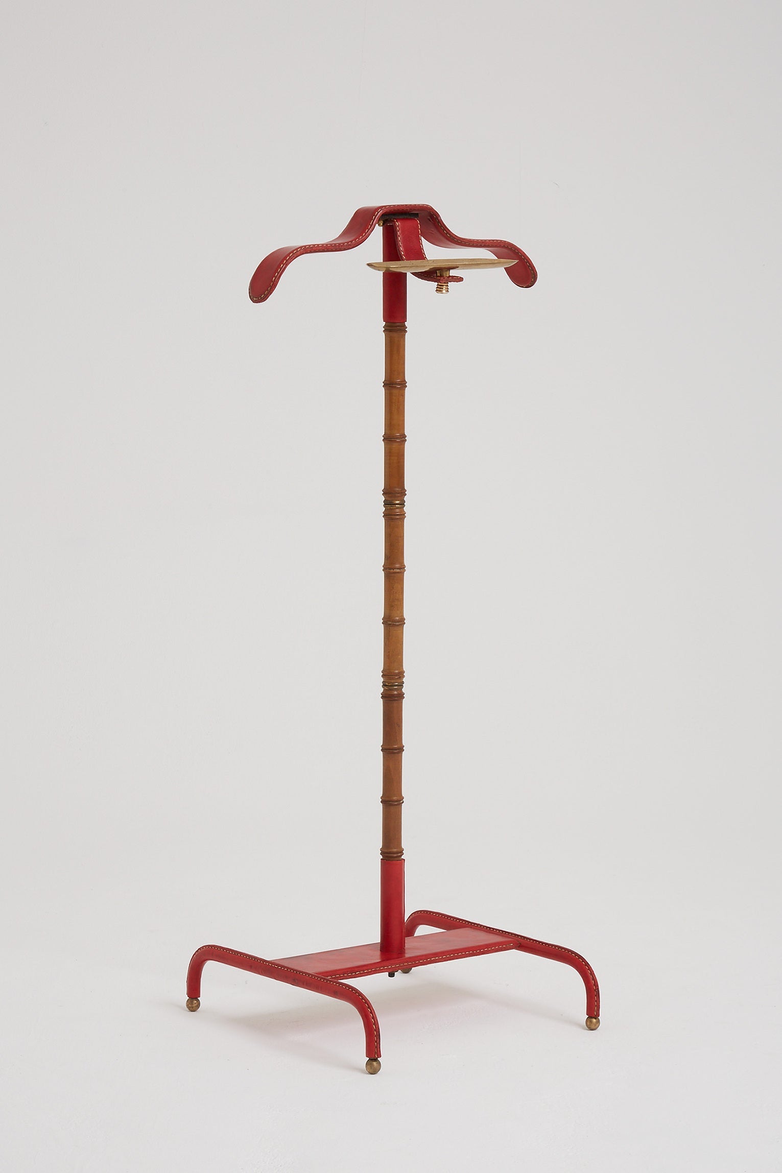 7633- Red Leather Valet by Jacques Adnet (1900-1984)