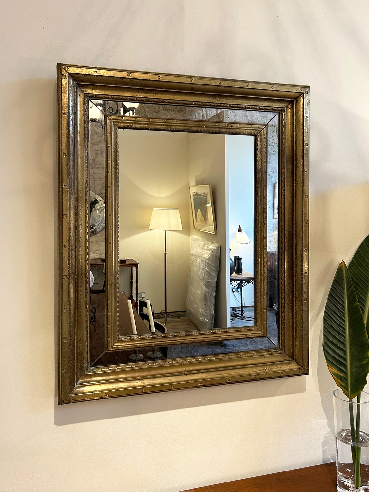 Mid-Century Brass Cushioned Mirror
