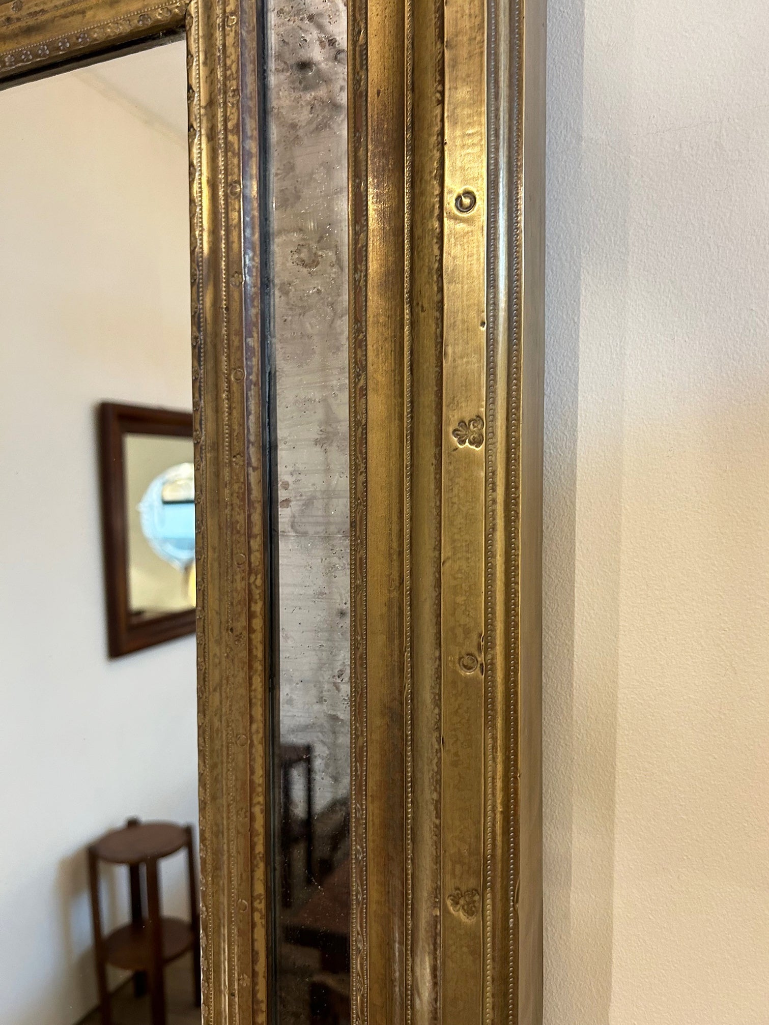Mid-Century Brass Cushioned Mirror