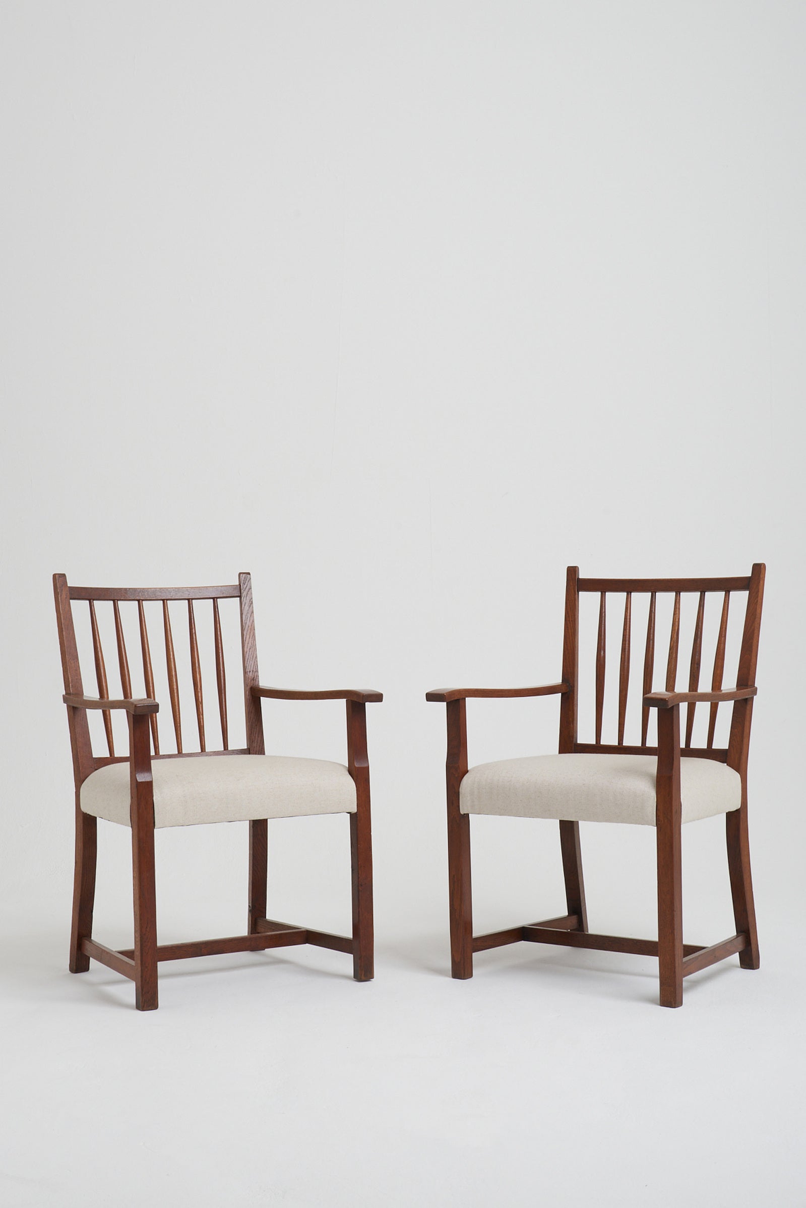 7848- Pair of Arts & Craft Oak Armchairs