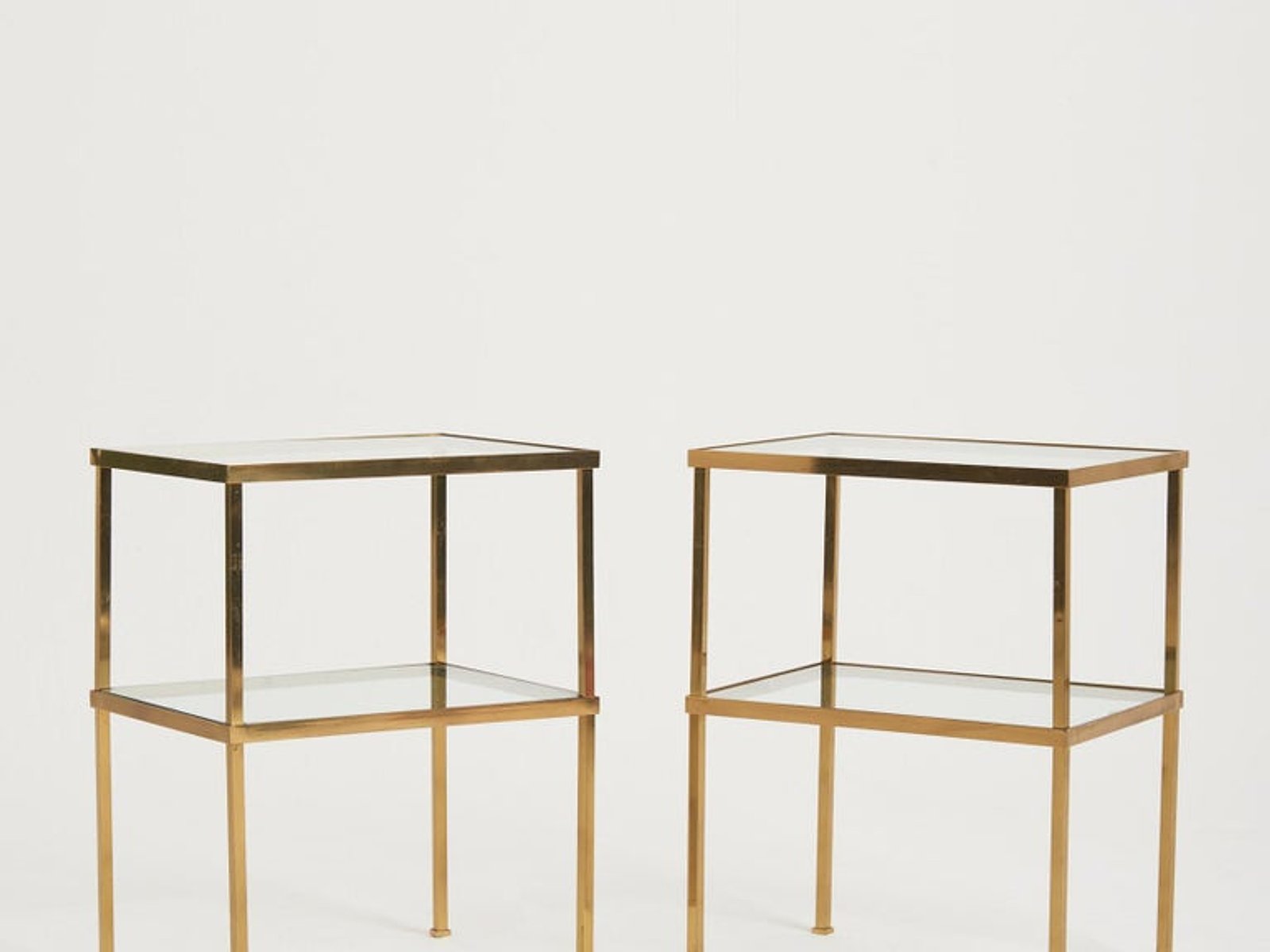7682- Pair of Mid-Century Brass Two-Tier Side Tables