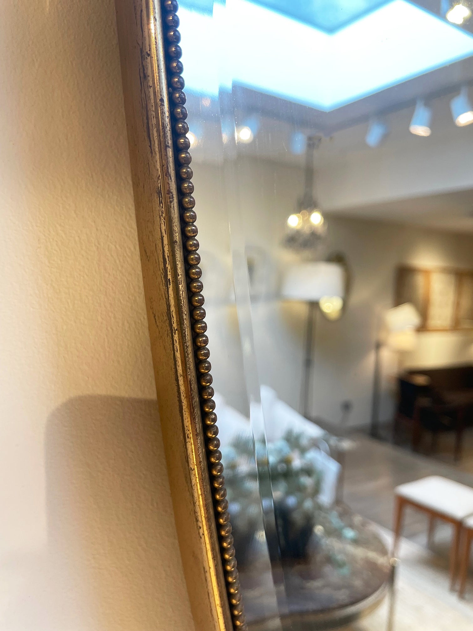 Mid-Century Brass Shield Mirror