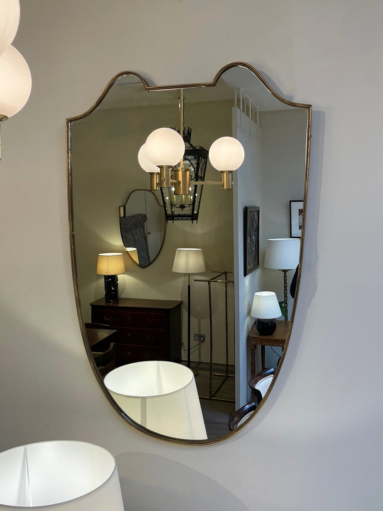 Pair of Brass Shield Mirrors