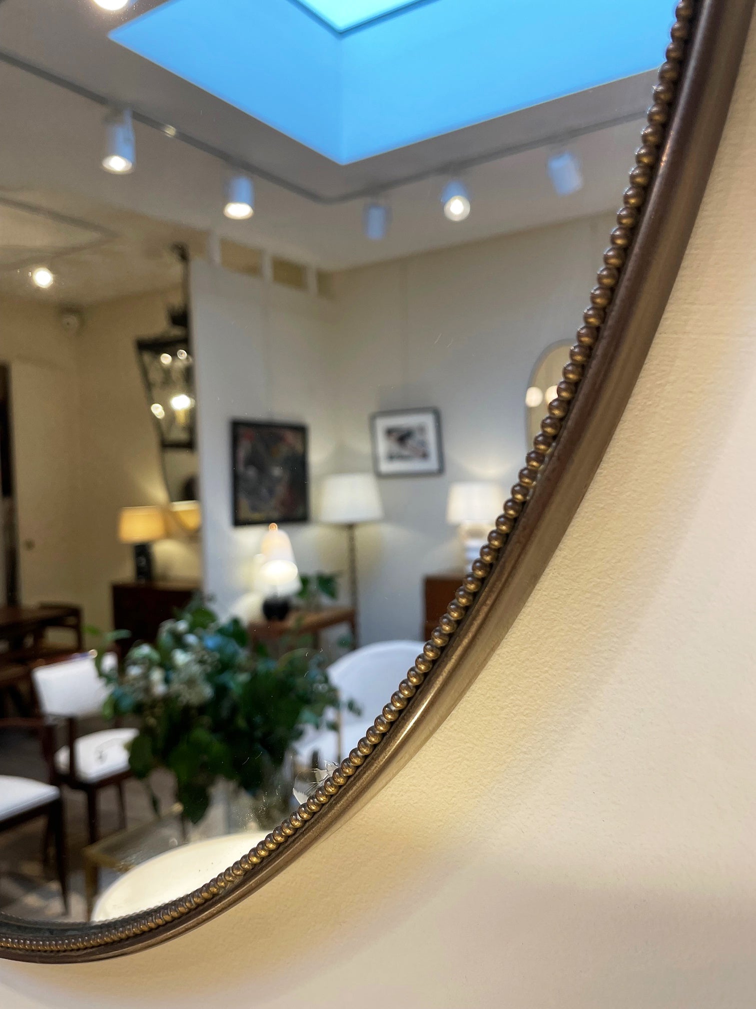 Pair of Brass Shield Mirrors