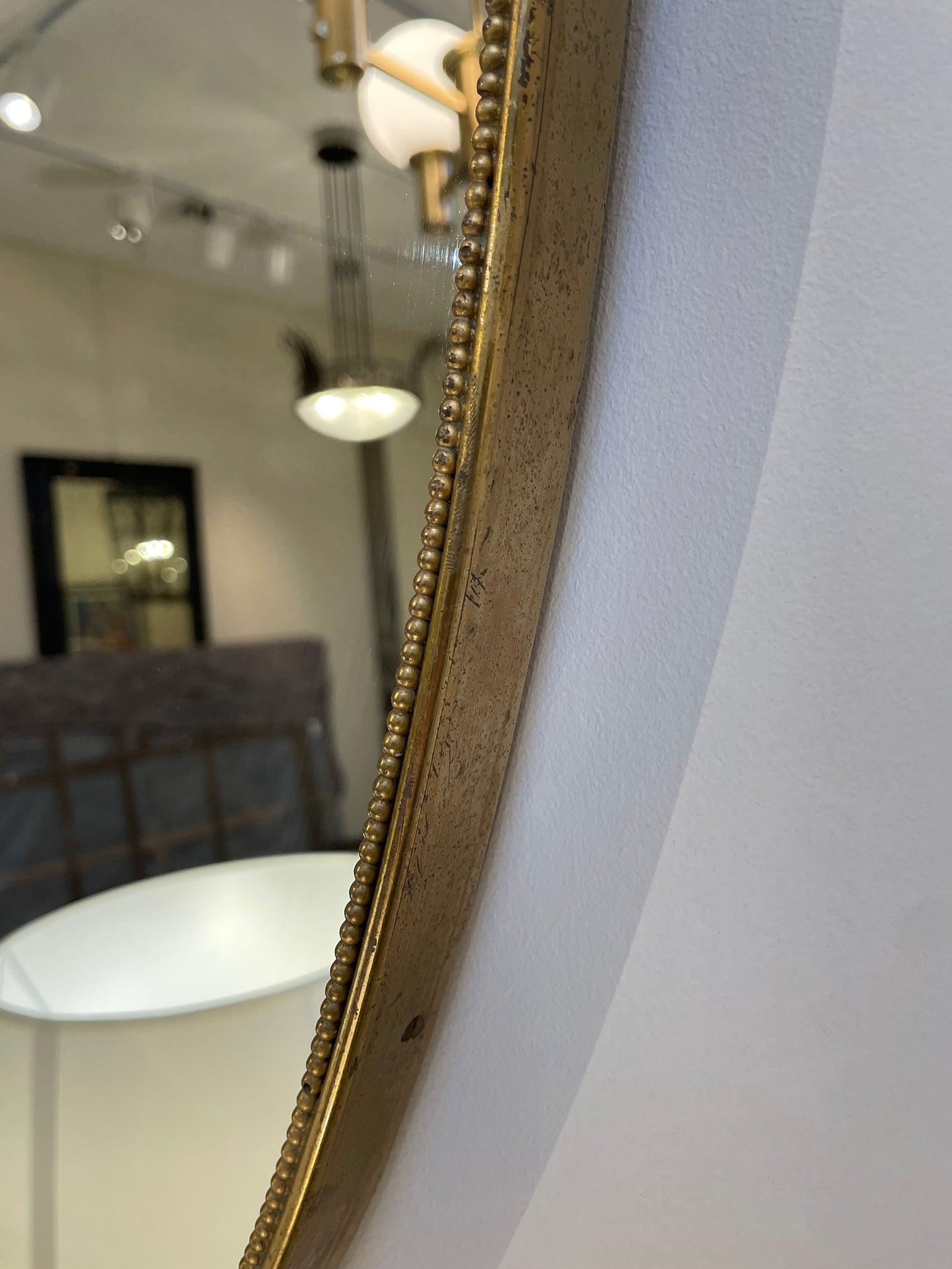 Pair of Brass Shield Mirrors