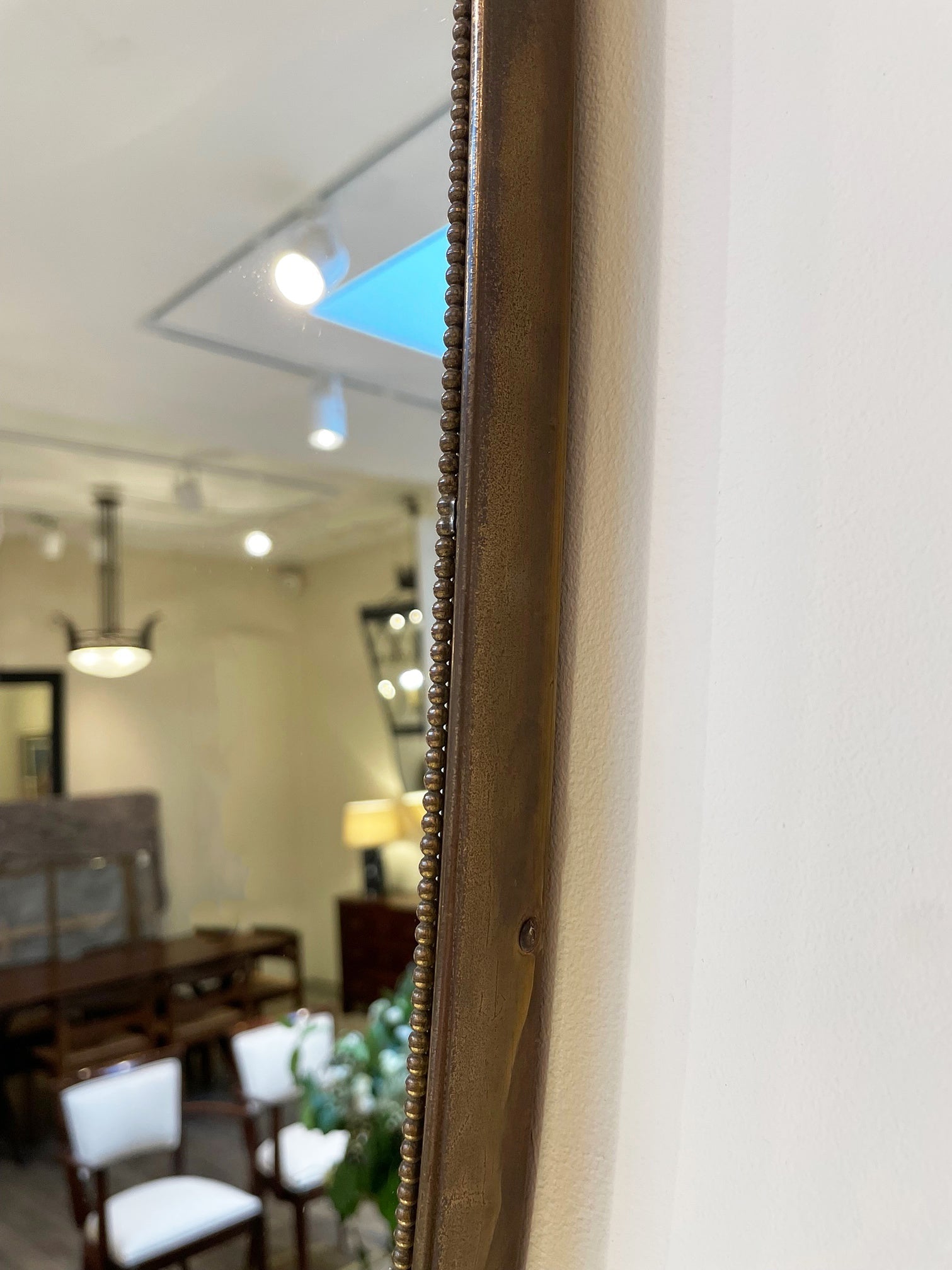 Pair of Brass Shield Mirrors