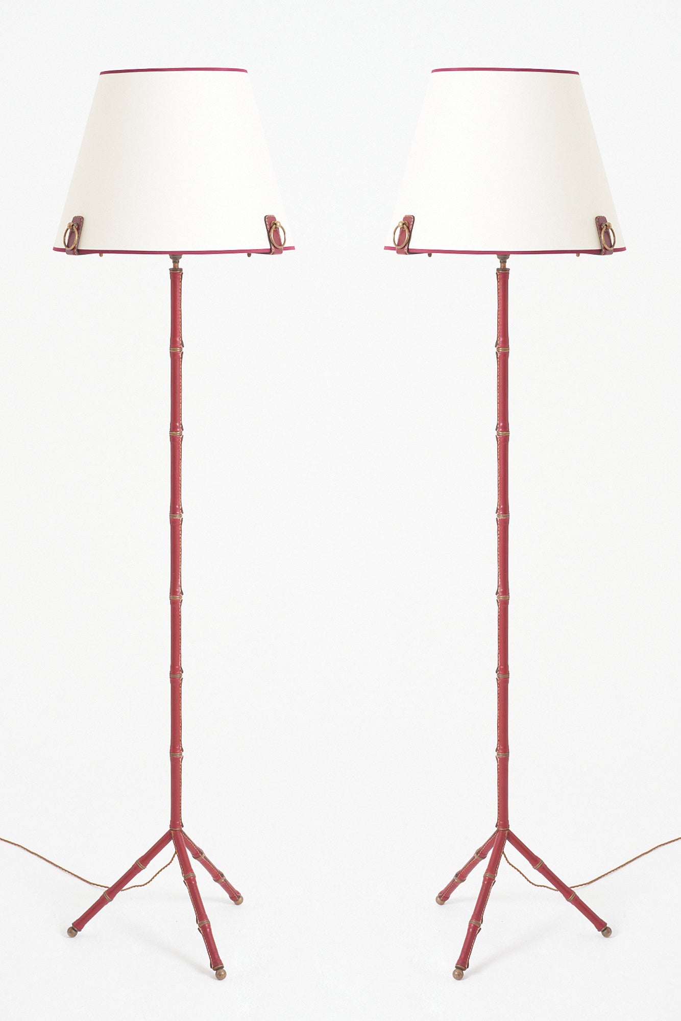 9072- Pair of Red Leather Floor Lamps by Jacques Adnet