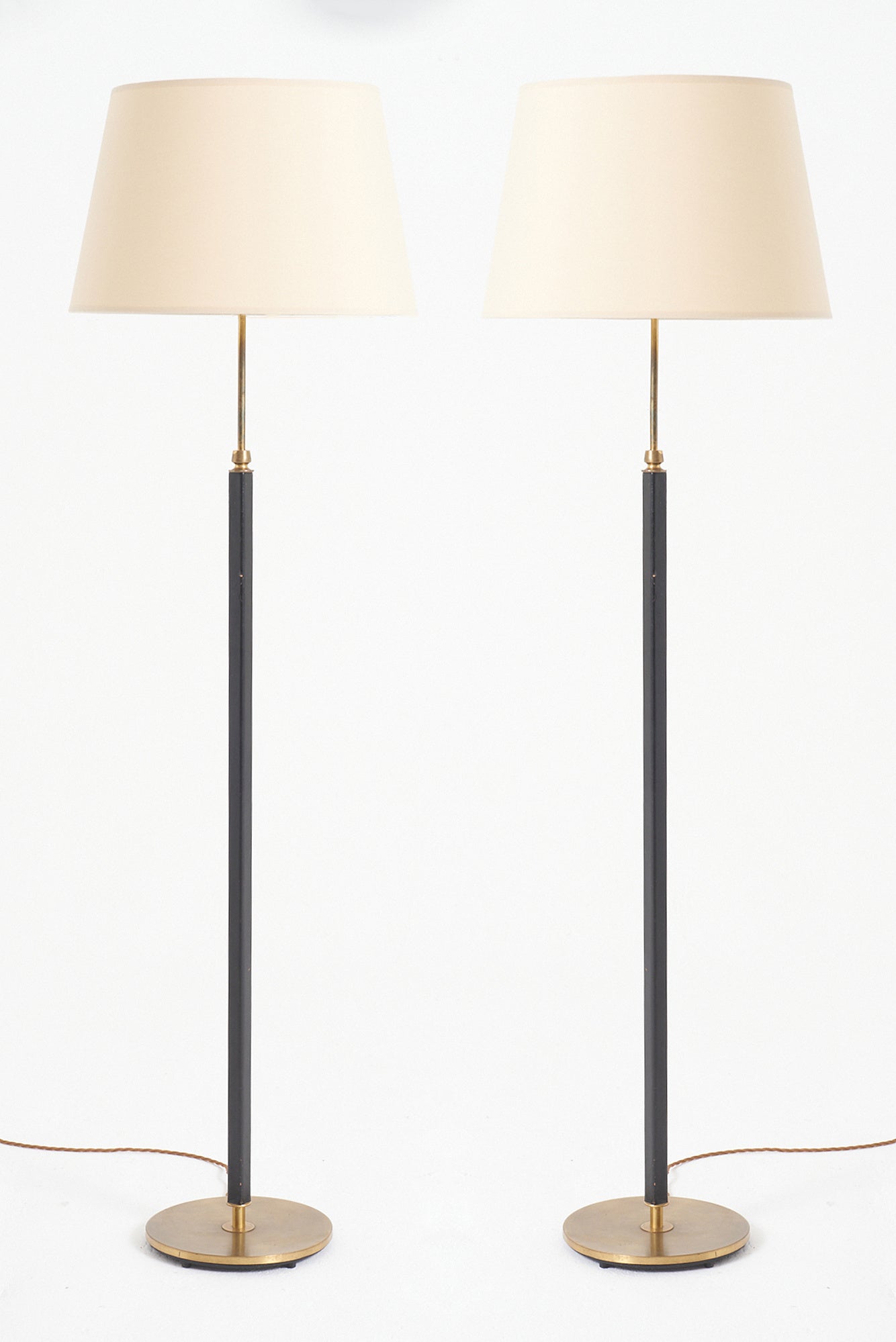 9096- Pair of Mid-Century Black Leather Floor Lamps