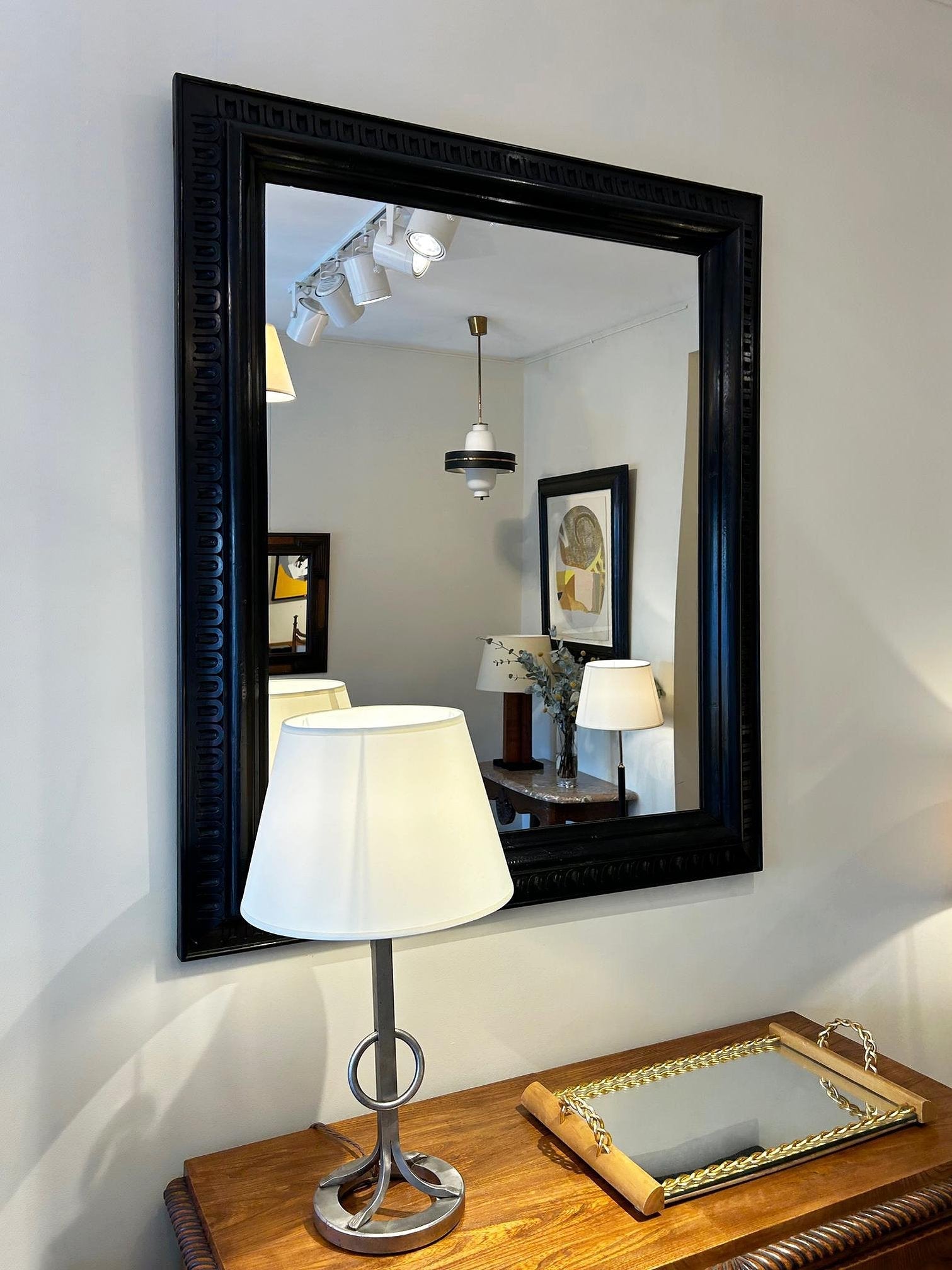 Pair of Ebonised Carved Wood Mirrors