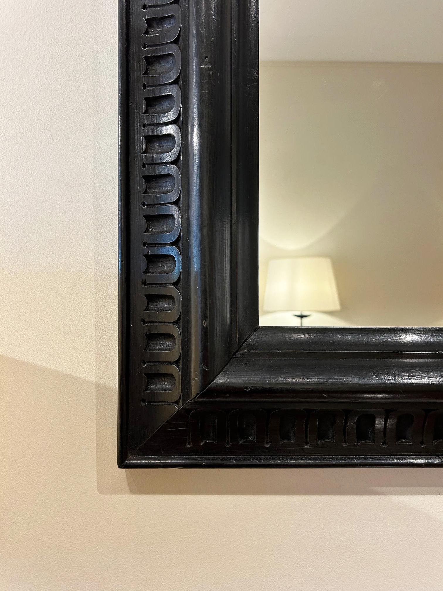 Pair of Ebonised Carved Wood Mirrors