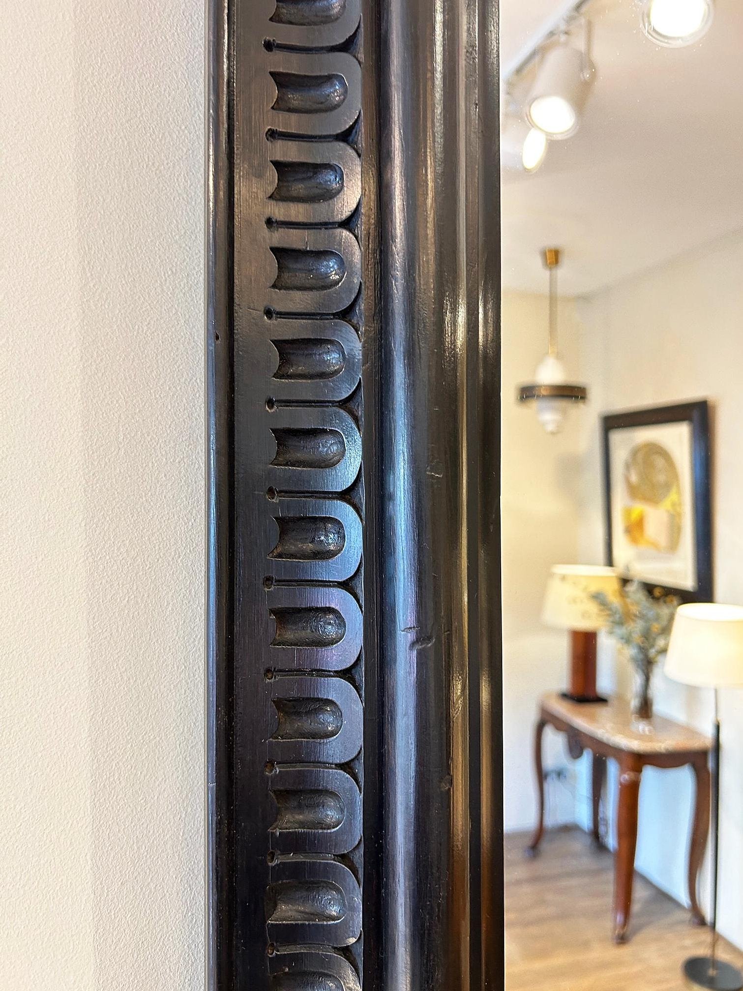 Pair of Ebonised Carved Wood Mirrors