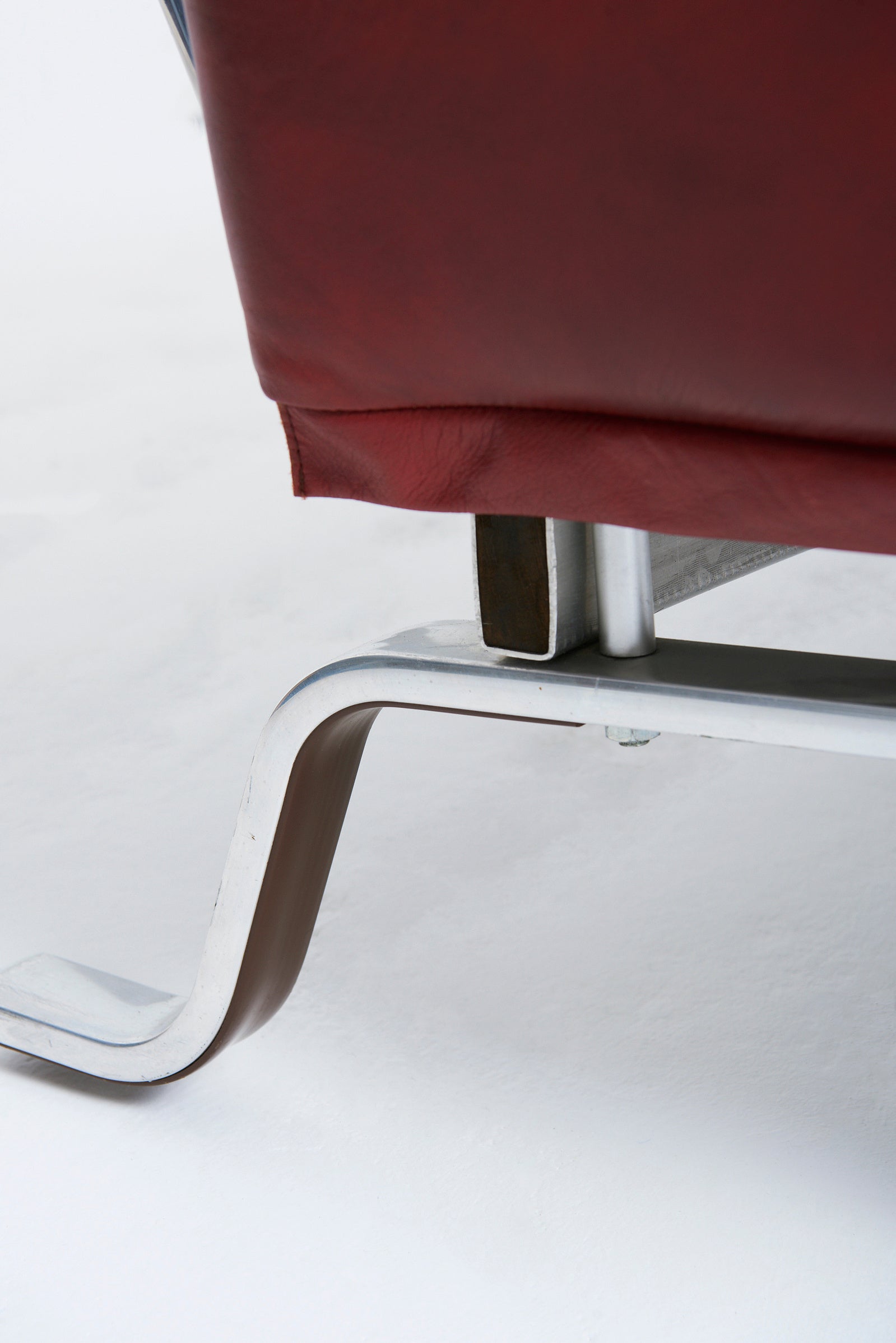 Red Leather Curved Sofa by Eric Sigfrid Persson