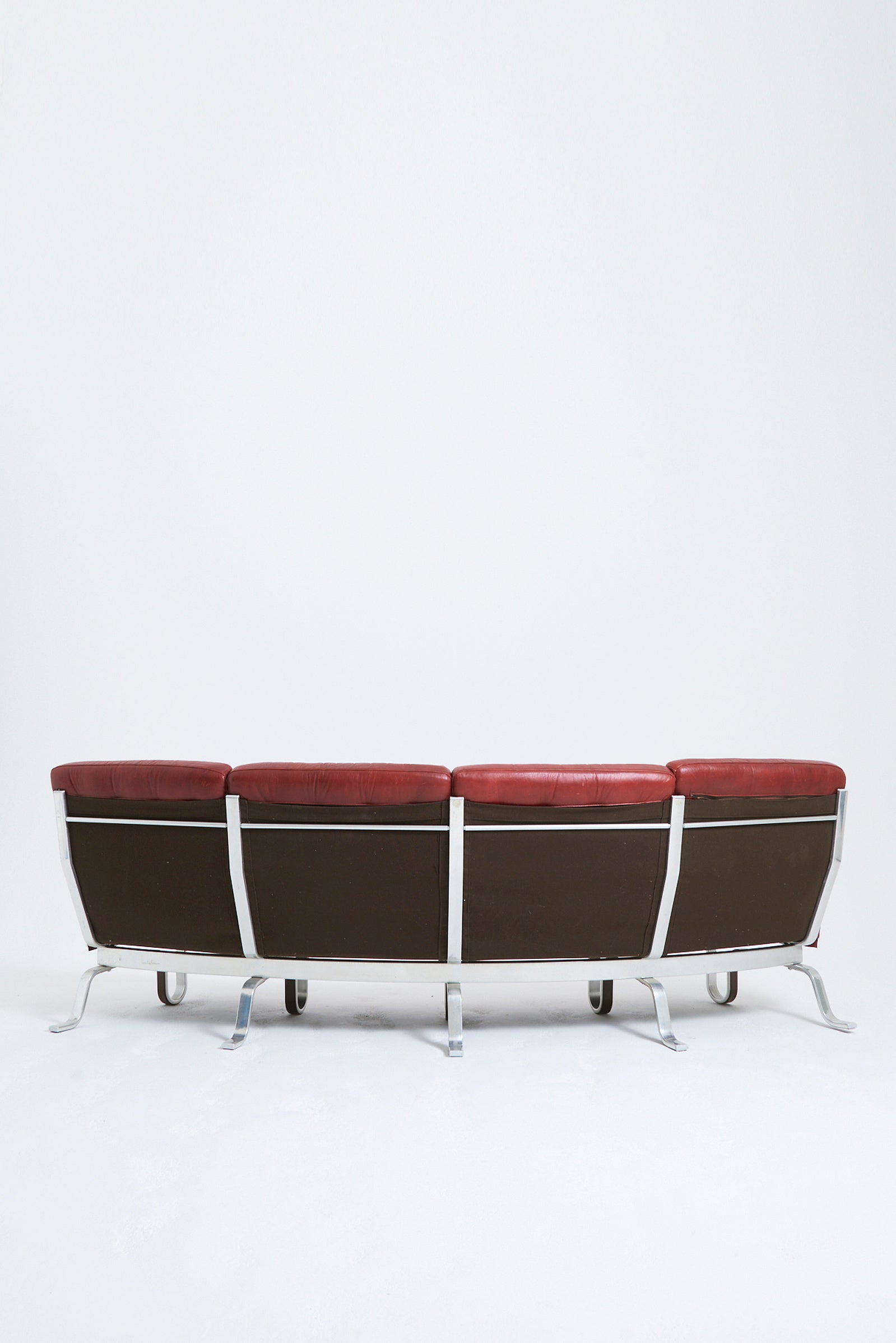 Red Leather Curved Sofa by Eric Sigfrid Persson