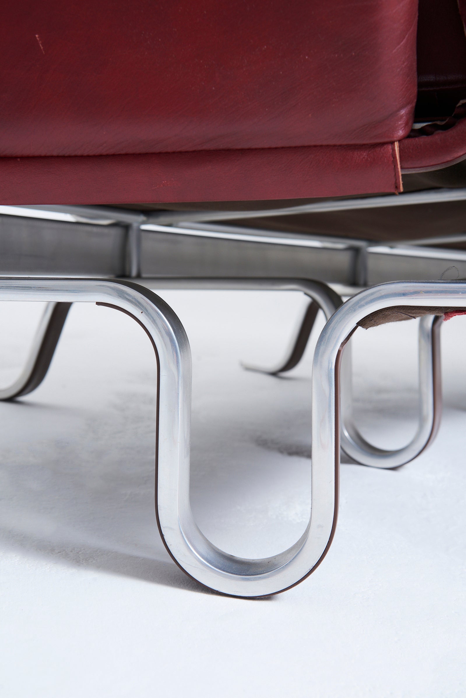 Red Leather Curved Sofa by Eric Sigfrid Persson