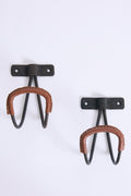9834- Coat Hangers by Jacques Adnet